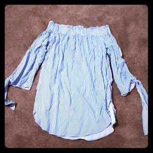 Never been worn off the shoulders blouse